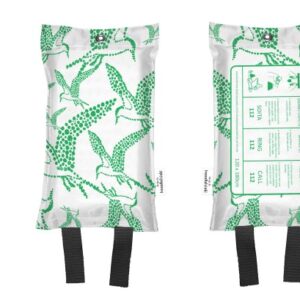 Raikas vihreänvalkoinen lintukuosi sammutuspeitteen päälle